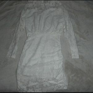 White long sleeved, laced flowered dress